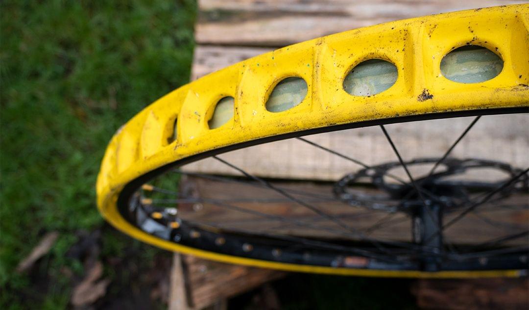 Rockstop rim protector mounted on a mountain bike wheel